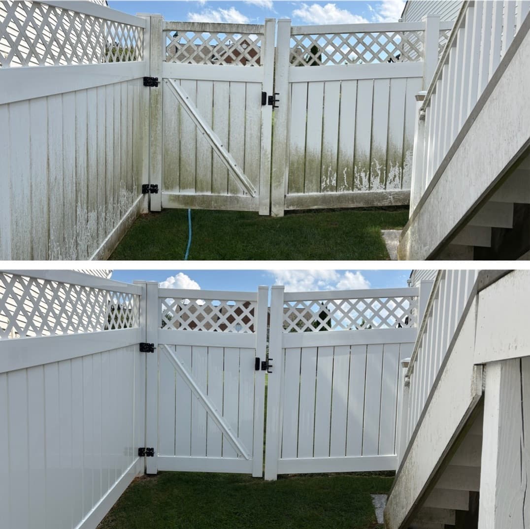 vinyl fence and gate cleaning beside the deck stairs, heavy green mildew removed, Maryland