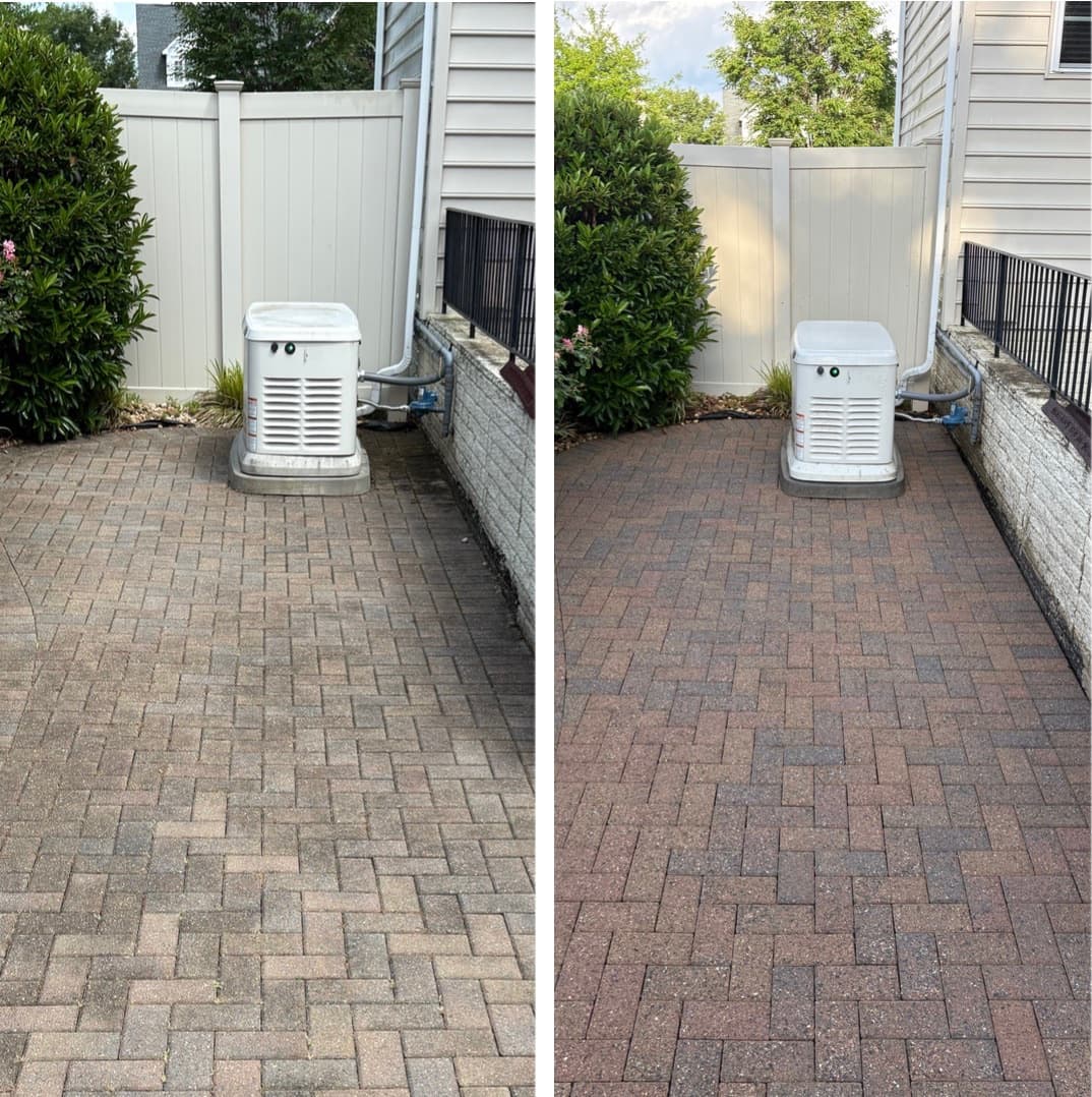 paver walkway cleaning around a standby generator, gray film washed back to red brick color, Maryland
