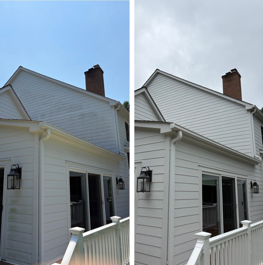 house washing a lap-siding gable beside a brick chimney, dark mildew streaks removed, Maryland