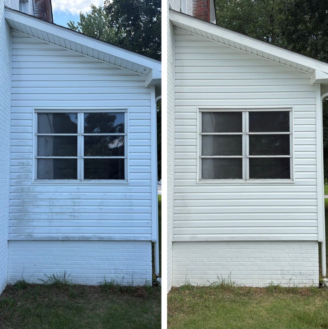 vinyl siding cleaning on a gable wall and window, green algae and grime washed off, Maryland